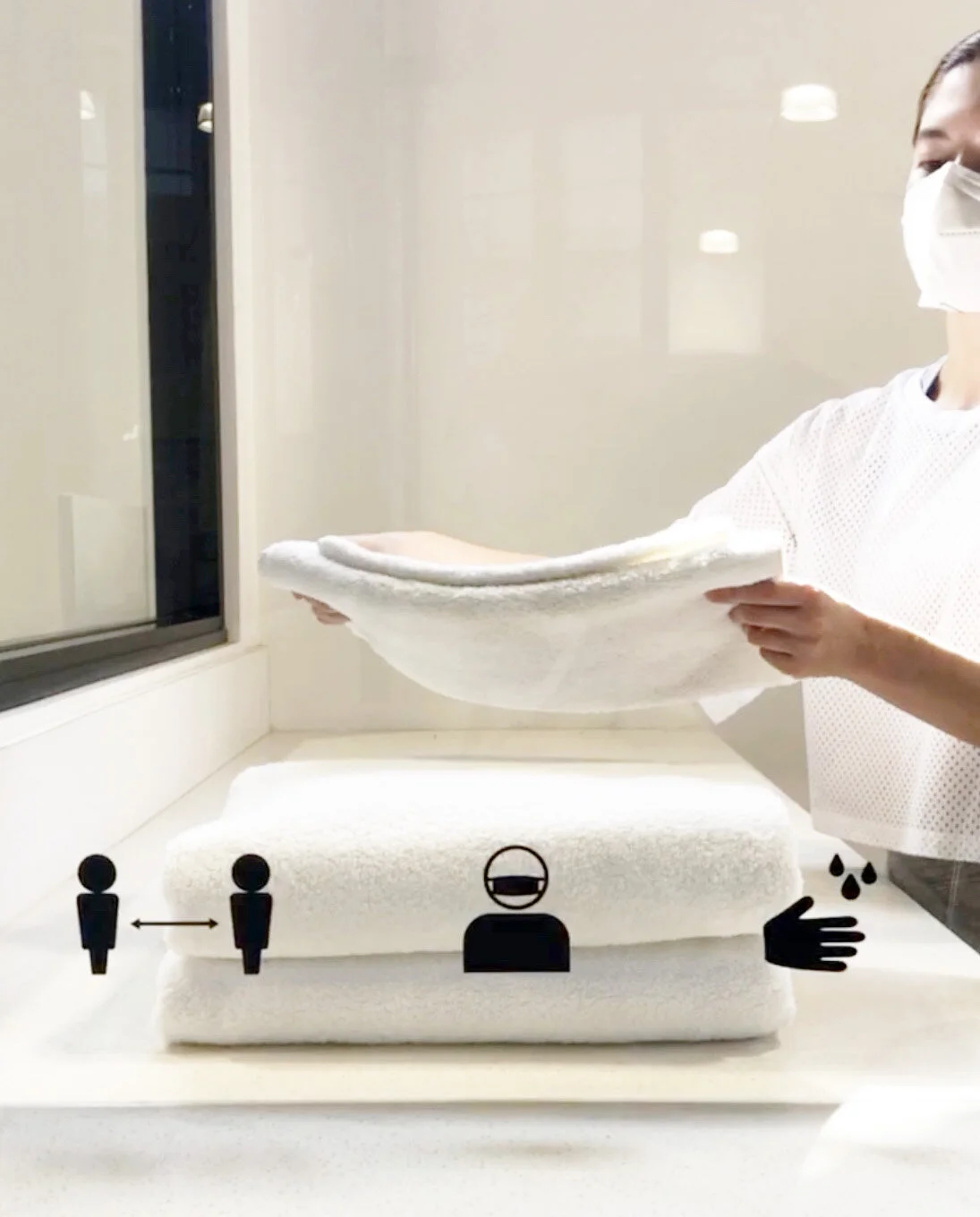 Neatly folded spa towels at Lucy's Laundry